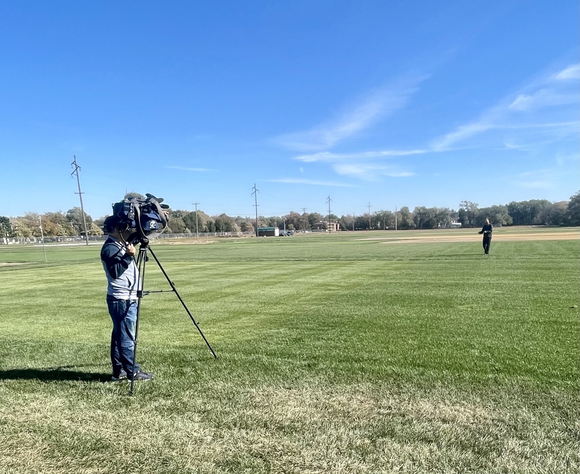 Video crew taking film for turfgrass news story from KETV in Omaha. 