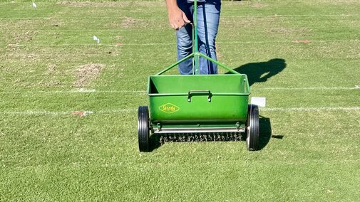 Matt doing overseeding on bermudagrass plots. 