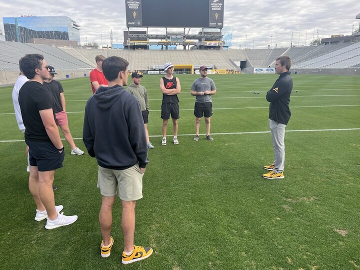 UNL turfgrass science and management students at game field outside State Farm Stadium